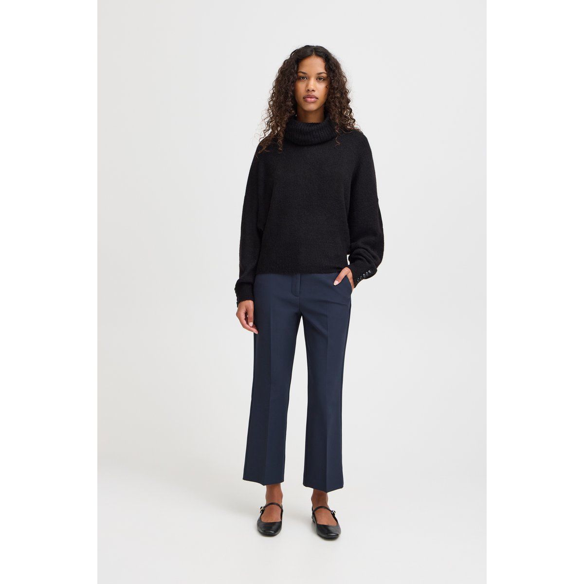 Lockere Rollkragenpullover mit Knopfdetails