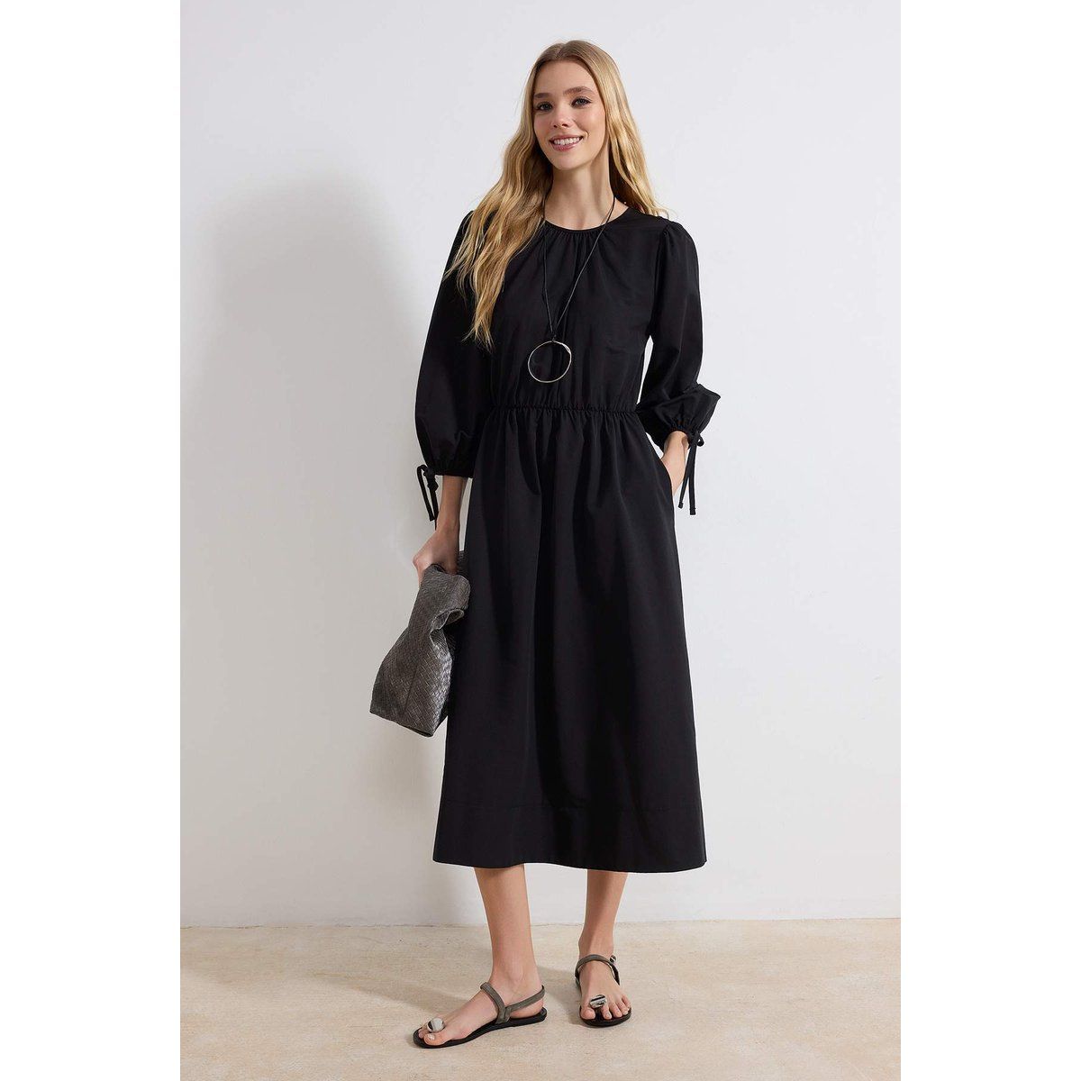 Minimalistisches A-Linien-Midikleid mit Schleifen