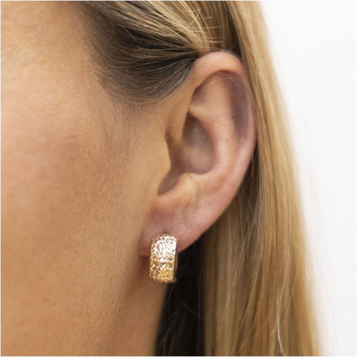 Diamantierte Creolen aus Gelbgold